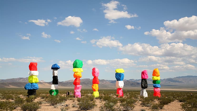 Seven Magic Mountains in Las Vegas — Ugo Rondinone's seven 30-foot stacks of fluorescent boulders rising out of the Mojave 25 minutes south of the Strip