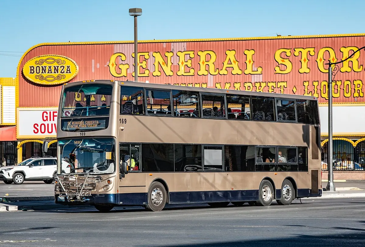 A double-decker Deuce bus on Las Vegas Boulevard near Sahara Avenue