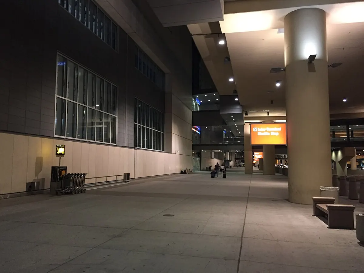 Covered lower-level walkway outside Terminal 3 at Las Vegas airport