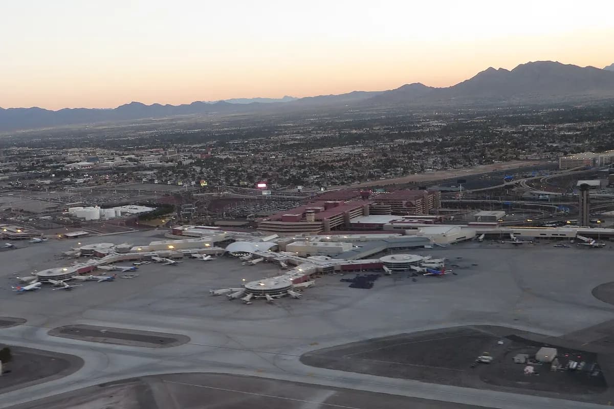 Airport terminals and runways seen from the air at daybreak